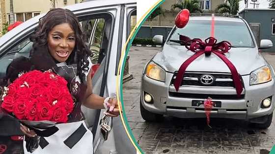 "What is your source of income?" Reactions as Nigerian lady flaunts luxurious new white car in video