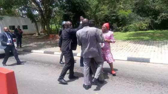 Help! - Oby Ezekwesili carries big banner, begins solo march over killings in Nigeria as she gets harassed by police (photos)