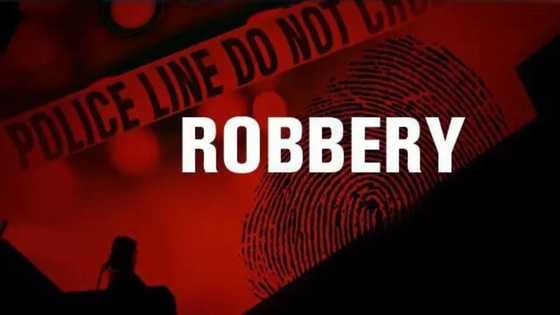 18 Armed Robbers Storm Bank, Rain Bullets